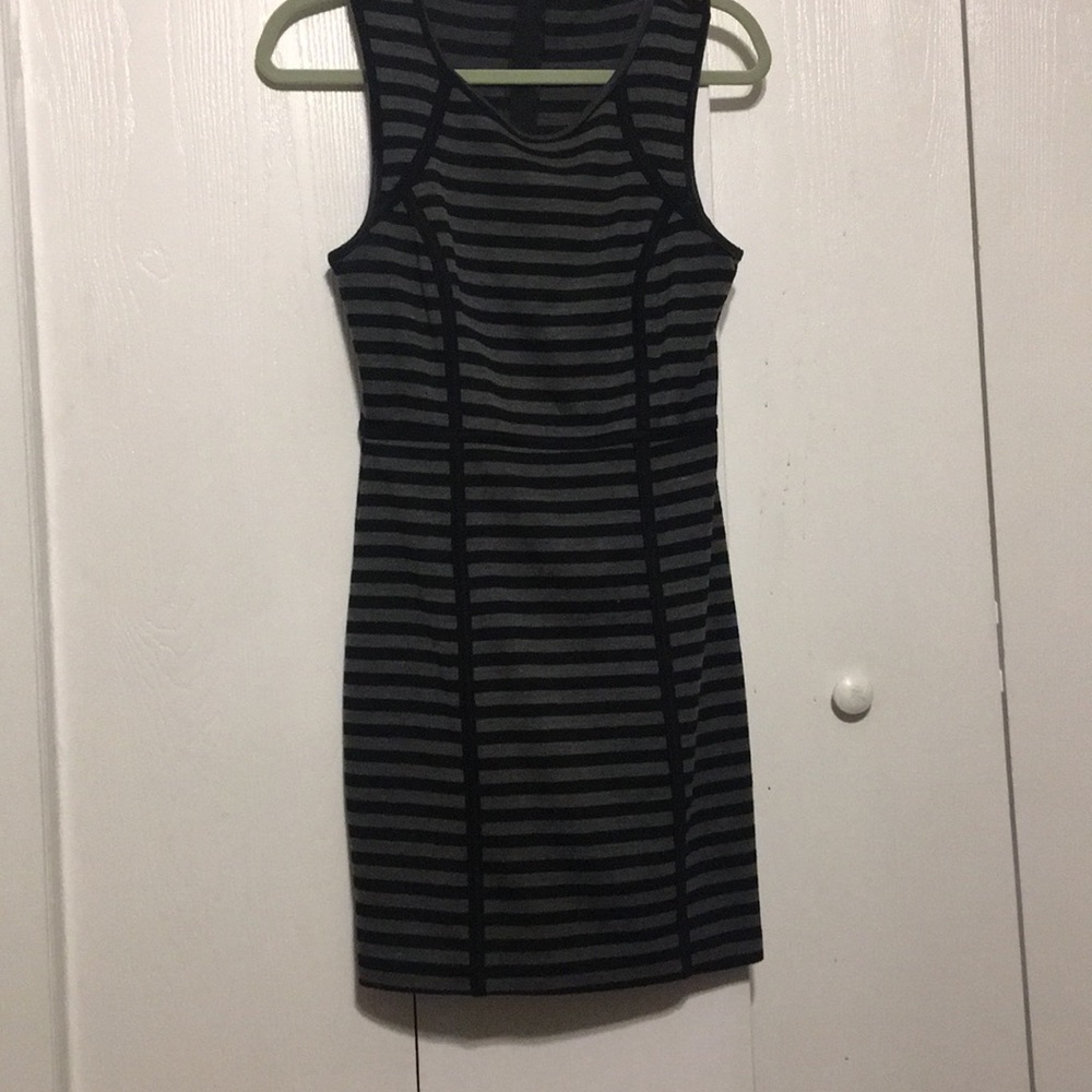 Black and grey knee length office dress.